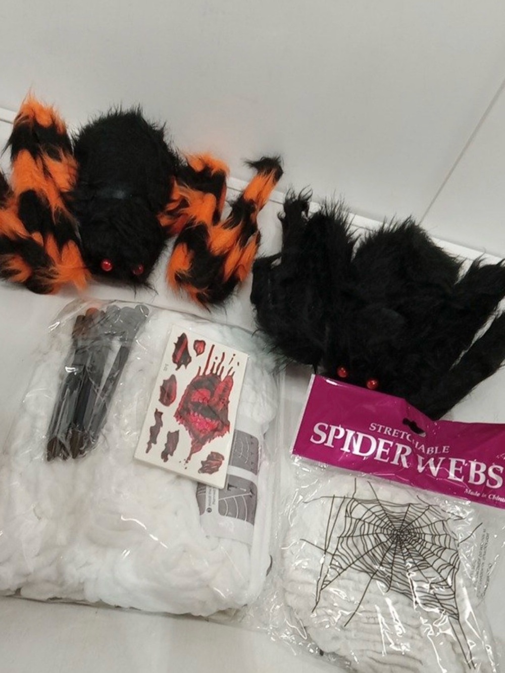 Set of Fuzzy Halloween Spiders with Orange & Black Accents includes large web